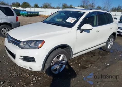 2011 Volkswagen Touareg Vr6 Lux z USA, uszkodzony, nr VIN WVGFF9BP6BD003726